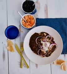 chilaquiles with mole, beans Mexican rice and viva mexico