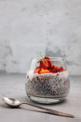 Dessert made of lactose-free milk with chia seeds and strawberries