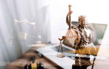Business and lawyers discussing contract papers with brass scale on desk in office. Law, legal services, advice, justice and law concept picture with film grain effect