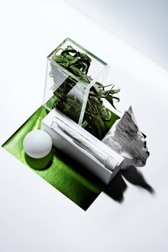 Artistic still life cannabis set with joint and marijuana leaf 