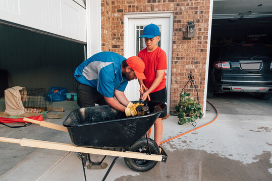 Family taking care of a group of raccoons. 