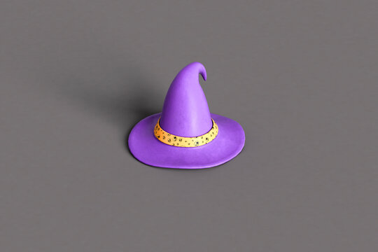 purple witch hat on dark grey background
