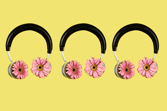 three spring headphones on a yellow background
