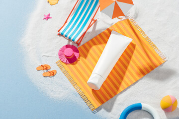 sunscreen product on beach mat with paper art style