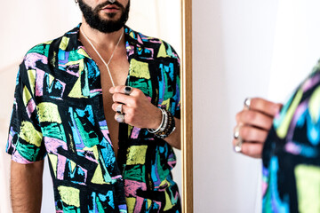 Detail of modern stylist looking at mirror