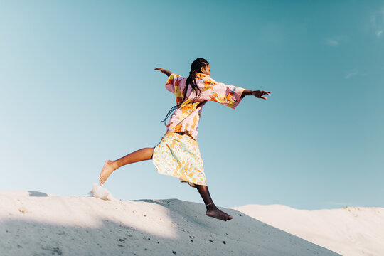 Carefree Black Woman Jumping