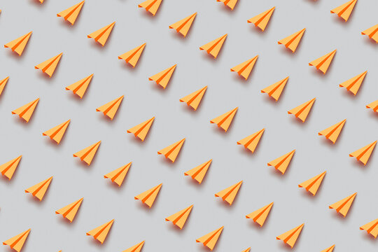 Pattern of creative orange paperplanes