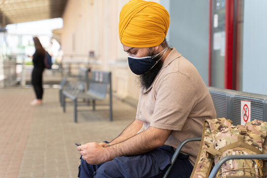 Sikh Man With Turban Using Cellphone