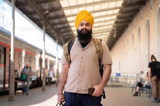 Man With Turban At Train Station