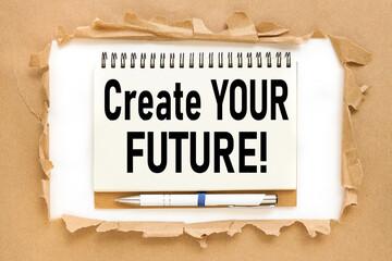 Create Your Future. text on notepad near torn paper