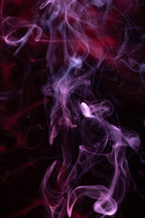 Multicolor Smoke painting on Black Background. Abstract.