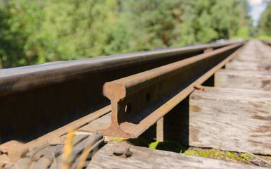 The old railway. Wooden sleepers. Steel rails