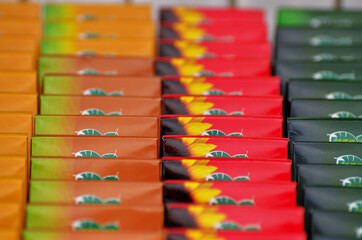 Pattern of multicolored boxes lined up in a close-up with a copy space. Russia Kazan 24.04.2021. High quality photo