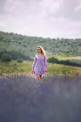 Woman on the summer lavender field
