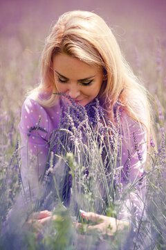 Woman on the summer lavender field
