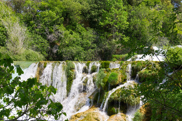 Mountainous beautiful waterfalls formed by the melting of glaciers due to global warming. Beautiful Waterfalls at Krka National Park in Croatia.