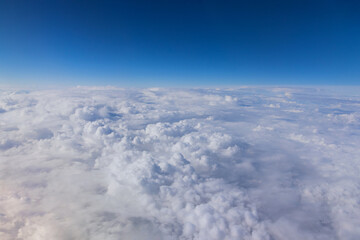 Fototapeta na wymiar White fluffy clouds in the blue sky cloud