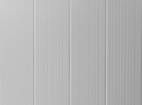 White wavy slate white pattern. White color plastic roof sheet texture background. Plastic roof, plastic cladding, profiled sheets for covering or fencing.