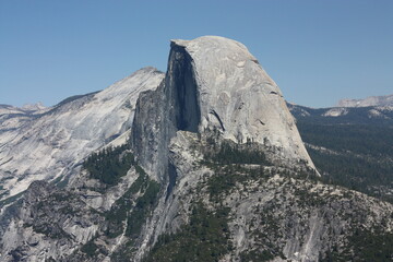 spectacular half dome  on a sunny day from  glacier point in yosemite valley in yosemite national park, california