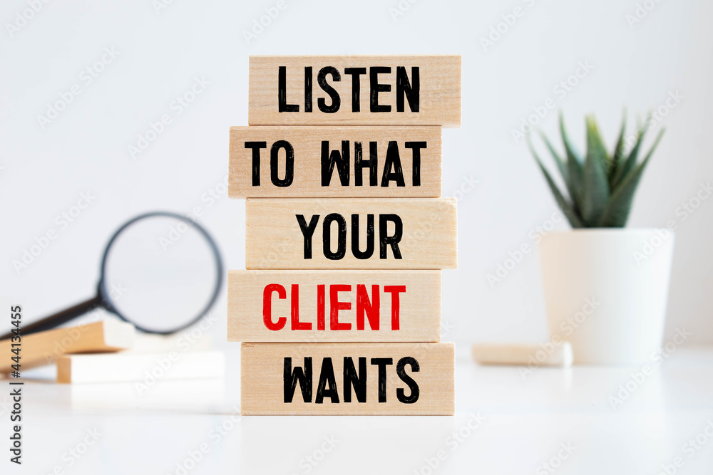 Poster office leather desk table with white notepad with textlisten to what your client wants. top view wit