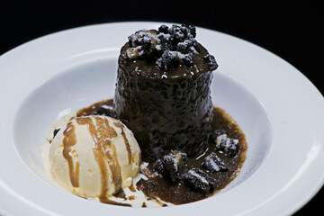 authentic sticky toffee pudding with vanilla ice cream and caramel sauce