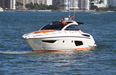 Cabin Cruiser idling on the Florida Intra-Coastal Waterway off of Miami Beach.