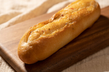 Japanese garlic toast on a cutting board.