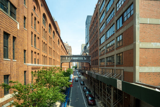 New York, NY - USA - July 6, 2021: Landscape view of East 15th Street of Chelsea, seen from the High Line. A 1.45-mile-long elevated linear park, greenway and rail trail.