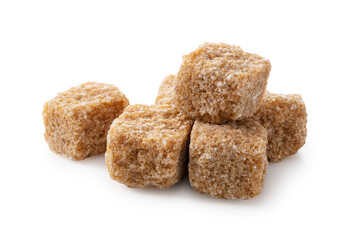 Brown sugar cubes placed on a white background.