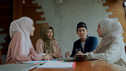 Business team of young muslim are discussing in meeting room