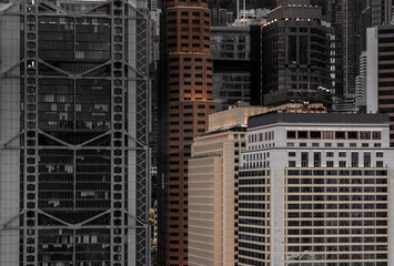 Fototapeta na wymiar Modern Hong Kong Architecture; Hong Kong Business Building Close up; black and gold color tone
