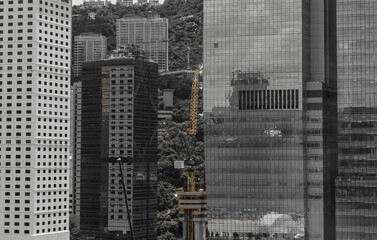 Modern Hong Kong Architecture; Hong Kong Business Building Close up; black and gold color tone