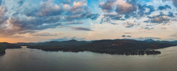 Sunset over the lake with colorful clouds