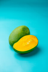 Mangoes on a blue background