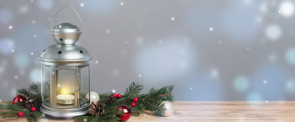 Lantern and Christmas decorations on grey background, space for text. Banner design
