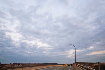 cloudy sky over the bridge
