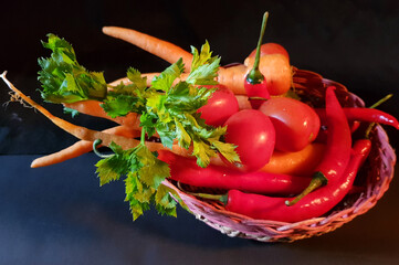 red chili, celery, tomato, carrot in a bamboo basket