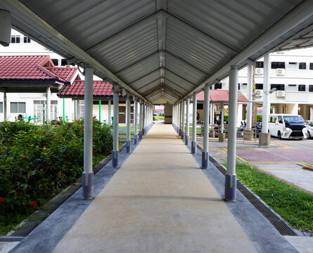 Sheltered Walkway Path In Between Blocks Of Flats In A Housing Estate In Singapore