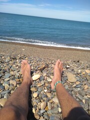 feet on the beach
