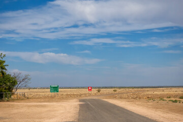 Signs on a rural road near Corfield in Queensland, Australia