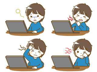 パソコン作業で疲れる幼い少年
