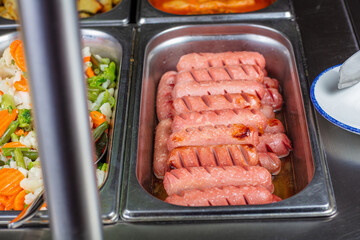 Hot fried sausages in their own juice.