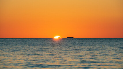 Sunset from Long Point with the sun setting over The Sisters, Port Kennedy