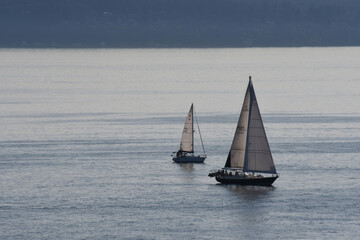 Fototapeta premium Two sailboats in the ocean close up