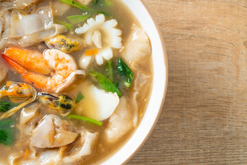 Wide Rice Noodles with Seafood in Gravy Sauce