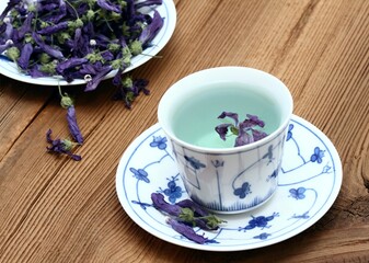 Herbal tea from dried flowers of Wild mallow, lat.  Malva sylvestris. Medicinal herb has been used...