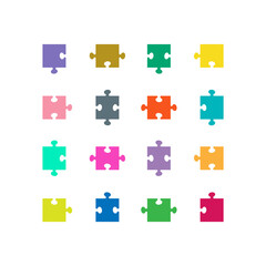 Naklejka premium A set of simple multi-colored puzzle pieces on a white background.