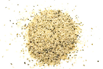 Organic shelled hemp seeds isolated on white background.