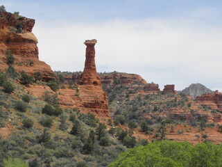  the red rock spire of kachina woman rock in boynton canyon, seen along the hiking trail  in spring...