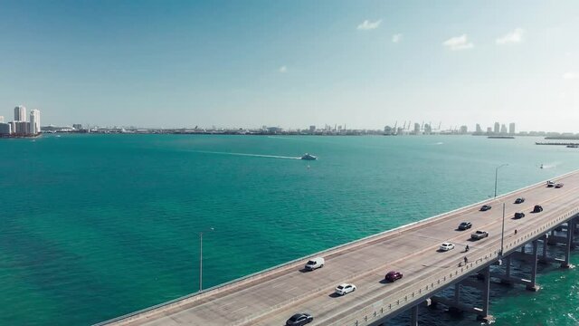 Aerial view of Rickenbacker Causeway in Miami, slow motion of car traffic. Slow motion